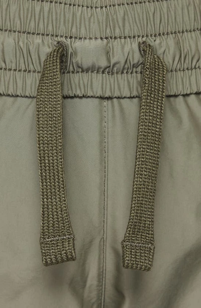Shop Nike Kids' Sportswear Woven Pants In Medium Olive/ Light Bone