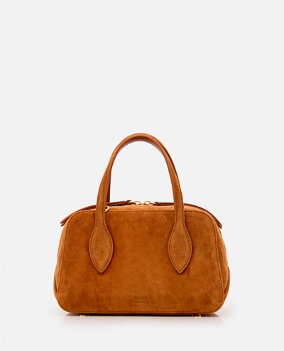 Shop Khaite Small Maeve Leather Crossbody Bag In Brown
