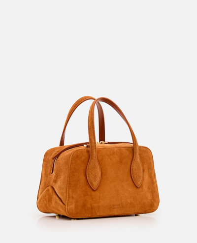 Shop Khaite Small Maeve Leather Crossbody Bag In Brown