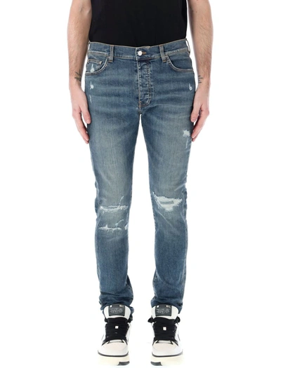 Shop Amiri Distressed Skinny Jeans In Crafted Indigo