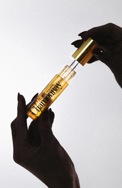 Vacation Chardonnay Lip Oil Spf 30 5.9ml In White