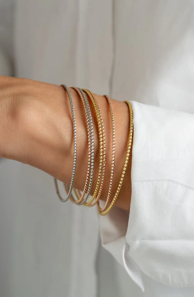 Adornia 14k Gold Plated Tri-color Skinny 7-piece Bangle Set In Multi