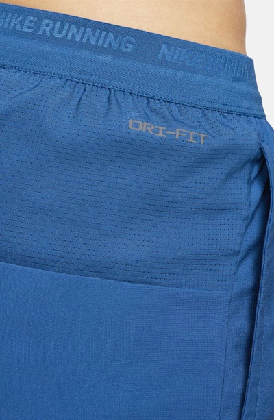 Shop Nike Energy Stride Dri-fit Running Shorts In Court Blue/ Safety Orange