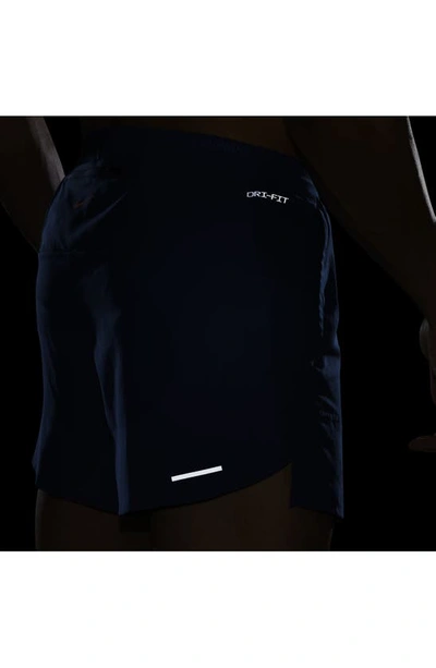 Shop Nike Energy Stride Dri-fit Running Shorts In Court Blue/ Safety Orange
