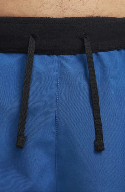 Shop Nike Challenger Dri-fit Shorts In Court Blue/ Black/ Black