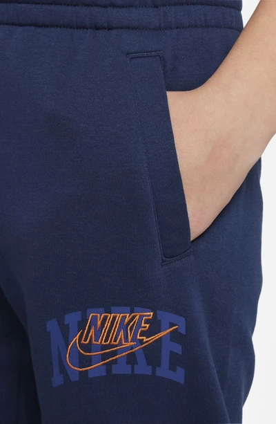 Shop Nike Kids' Sportswear Fleece Joggers In Midnight Navy/ Safety Orange