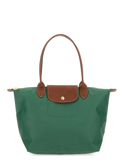 Shop Longchamp "le Pliage" Bag In Green
