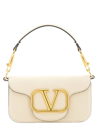 Shop Valentino Garavani Shoulder Bag "locò" Small In Ivory