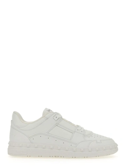 Shop Valentino Garavani Low Top Sneaker "freedots" In White