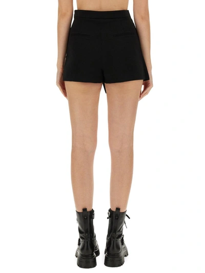 Shop Moschino Wallet Skirt In Black