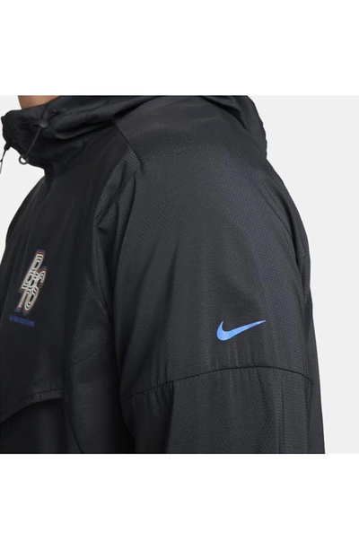 Shop Nike Windrunner Water Repellent Upf 50+ Packable Hooded Jacket In Black/ Black/ Hyper Royal
