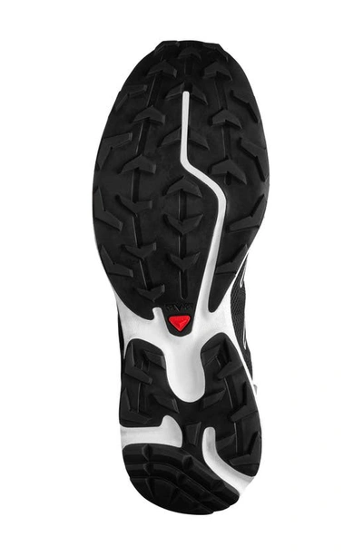 Shop Salomon Gender Inclusive Xt-rush 2 Sneaker In Black/ White/ Poppy Red