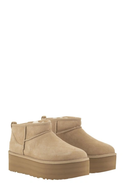 Shop Ugg Ultra Mini Classic - Boots With Plateau In Sand