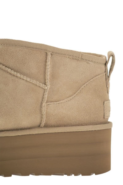 Shop Ugg Ultra Mini Classic - Boots With Plateau In Sand