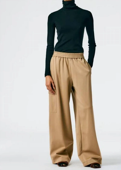 Shop Tibi Featherweight Ribbed Turtleneck Sweater In Black In Beige