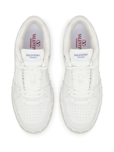 Shop Valentino Garavani Freedots Leather Sneakers In White