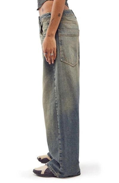 Shop Bdg Urban Outfitters Jaya Tinted Low Rise Wide Leg Jeans In Green Tint Vintage