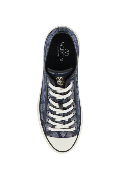Shop Valentino Garavani Totaloop Low-top Sneakers In Denim-effect Toile Iconographe In Blue