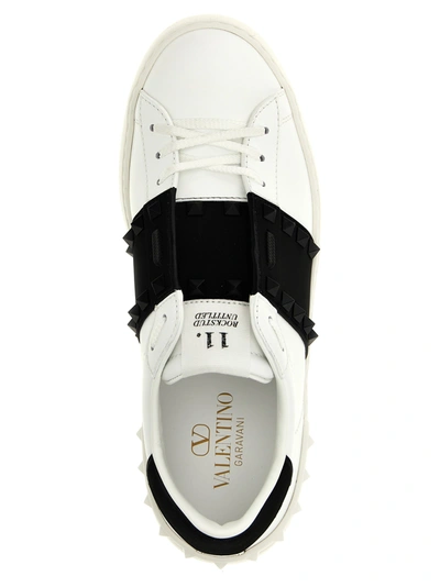 Shop Valentino Rockstud Untitled Sneakers White/black