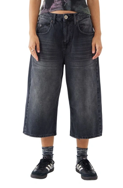 Shop Bdg Urban Outfitters Jaya Low Rise Crop Wide Leg Jeans In Washed Black