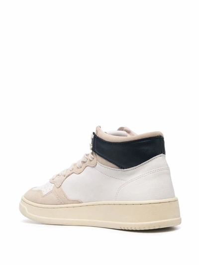 Shop Autry 'medalist Mid' Sneakers In White