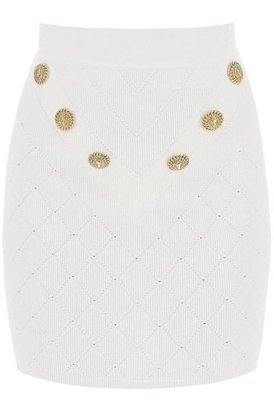 Shop Balmain Knitted Mini Skirt With Embossed Buttons In White