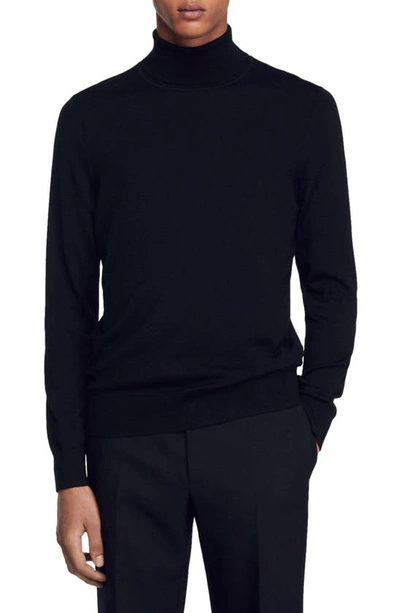Shop Sandro Wool Turtleneck Sweater In Black