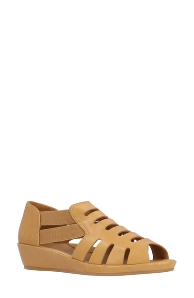 Shop L'amour Des Pieds Bayla Wedge Sandal In Lioness