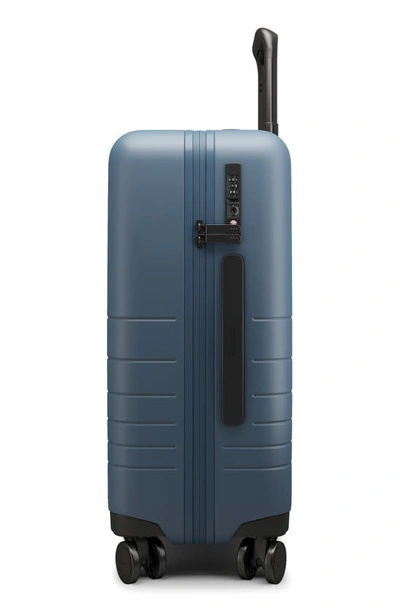 Shop Monos 23-inch Carry-on Plus Spinner Luggage In Ocean Blue