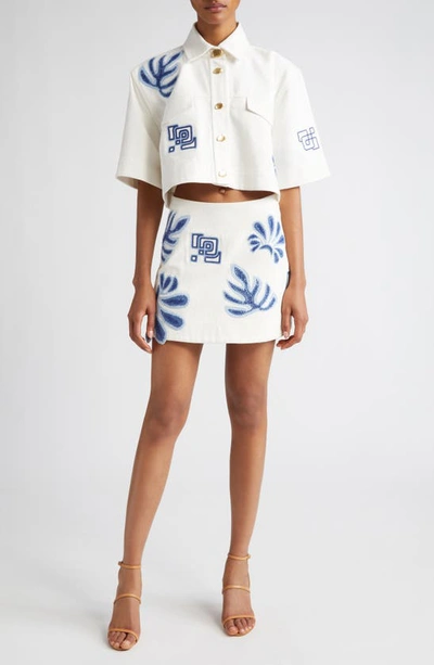 Shop Aje Espirit Floral Embroidery Cotton Miniskirt In Ivory-blue