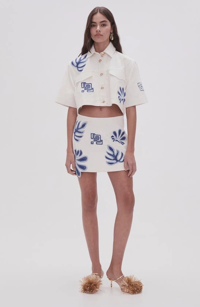 Shop Aje Espirit Floral Embroidery Cotton Miniskirt In Ivory-blue