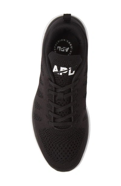 Shop Apl Athletic Propulsion Labs Techloom Pro Knit Running Shoe In Black/ White/ Black