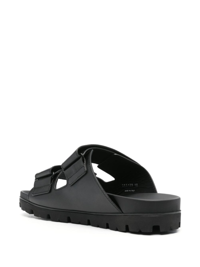 Shop Prada Leather Sandals In Black