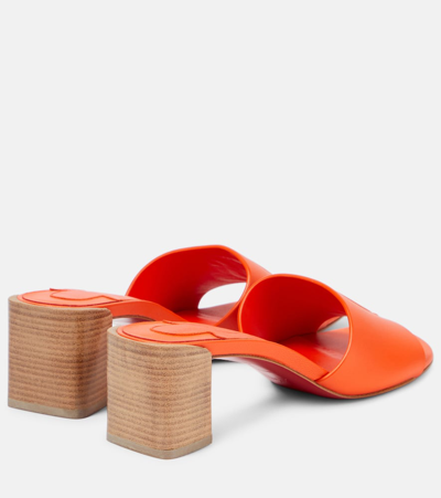 Christian Louboutin So Cl 55 Embossed Leather Mules In Orange