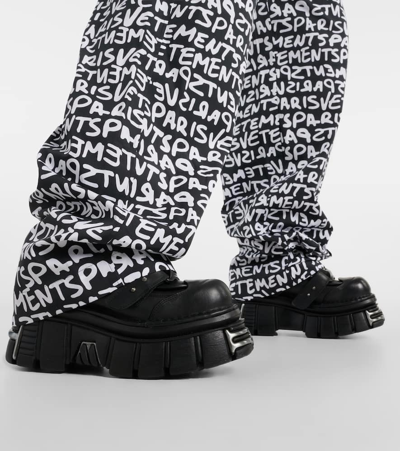 Vetements Printed High-rise Cotton Wide-leg Pants In Multicoloured