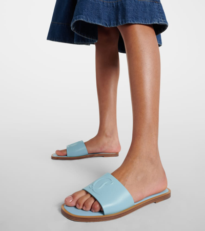 Christian Louboutin Cl Embossed Leather Mules In Blue