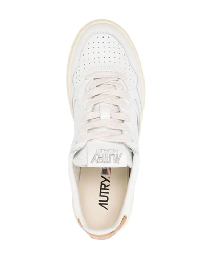 Shop Autry Medalist White And Bronze Sneakers Shoes