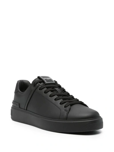 Shop Balmain Leather Sneakers With Panels In Black