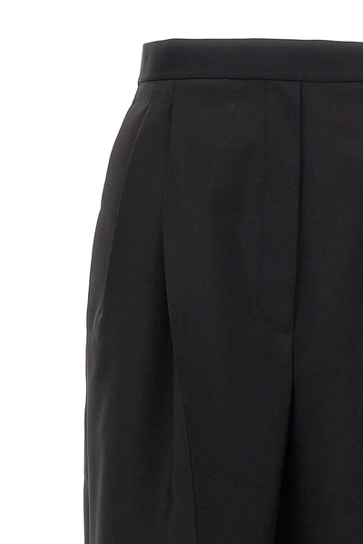 Shop Prada Women Logo Front Pleat Pants In Black