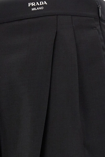 Shop Prada Women Logo Front Pleat Pants In Black