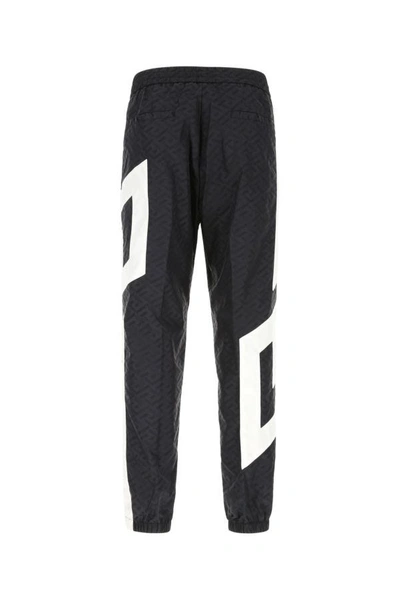 Shop Versace Man Printed Nylon Joggers In Multicolor