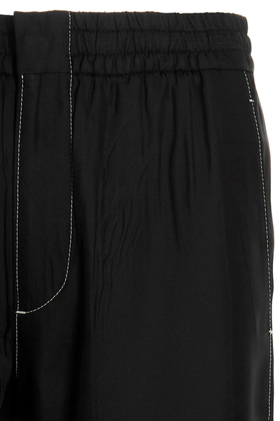 Shop Prada Men Silk Trousers In Black