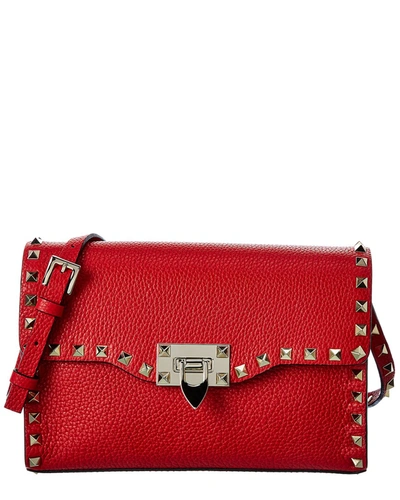 Shop Valentino Rockstud Small Grainy Leather Crossbody In Red