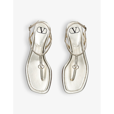 Shop Valentino Garavani Women's Gold Vlogo Leather Thong Sandals