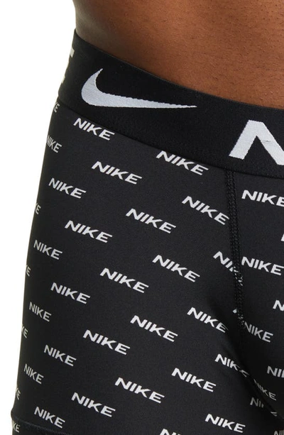 Shop Nike 3-pack Dri-fit Essential Micro Trunks In  Logo/ Grey/ Black