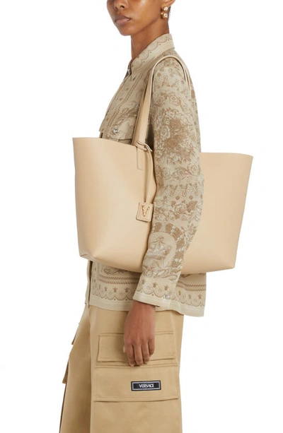 Shop Versace Virtus Leather Tote In Sand/ Multicolor/ Gold