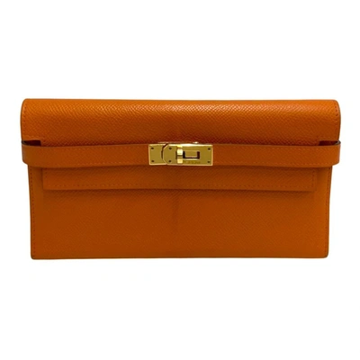 Shop Hermes Hermès Kelly Orange Leather Wallet  ()