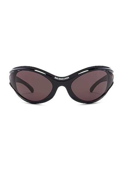 Shop Balenciaga Dynamo Sunglasses In Shiny Black