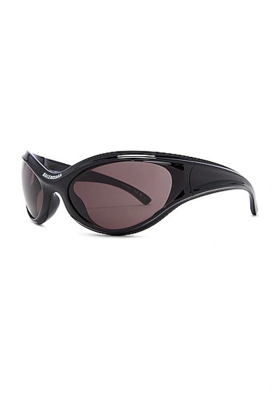Shop Balenciaga Dynamo Sunglasses In Shiny Black