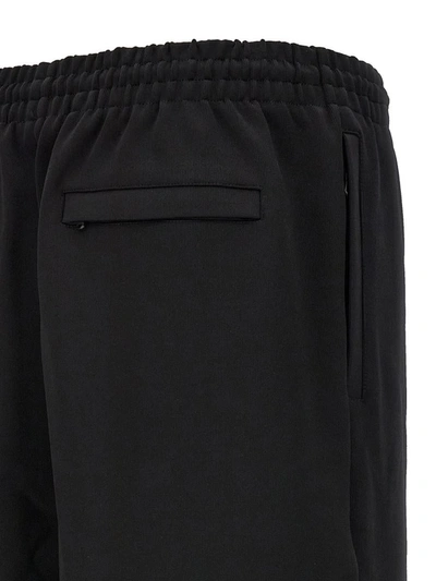 Shop Wardrobe.nyc 'semi Matte Track' Joggers In Black